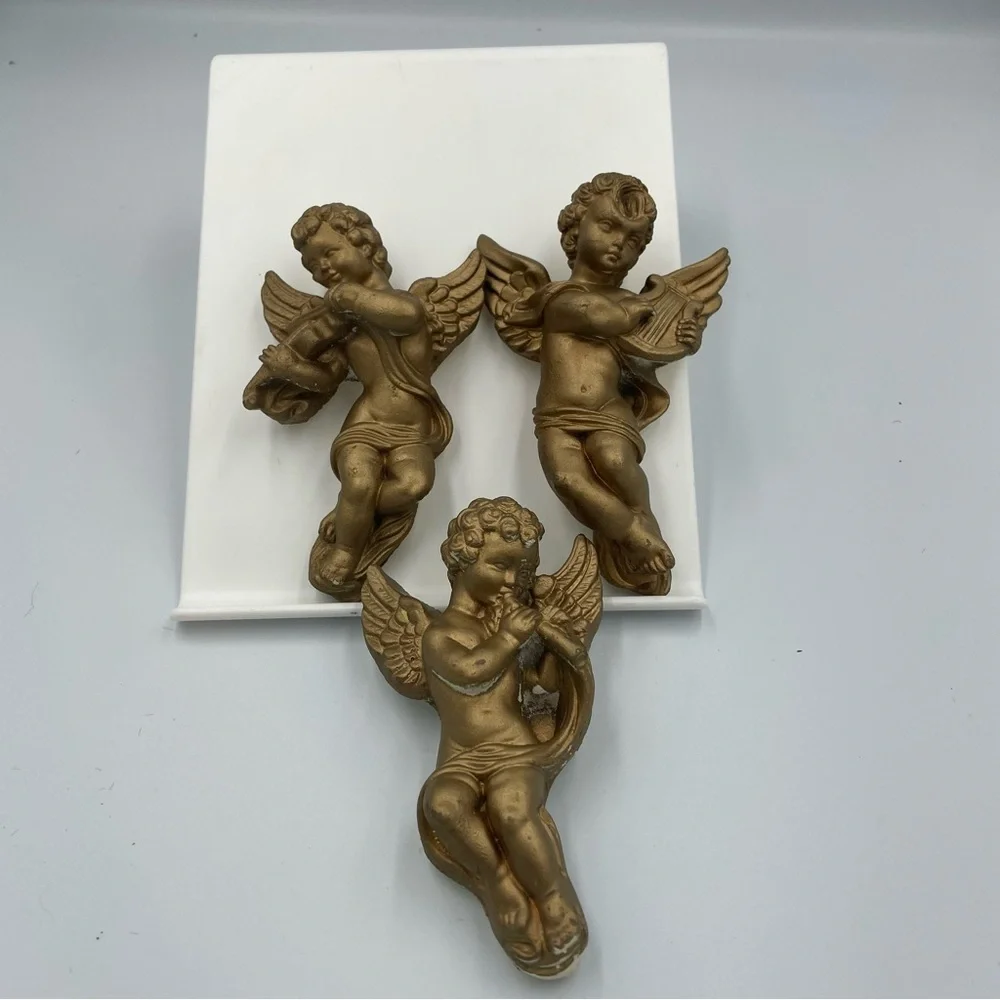 Vintage Chalk ware Gold Angel Wall Decor Set of 3. Some peeled paint. Head sunk.
